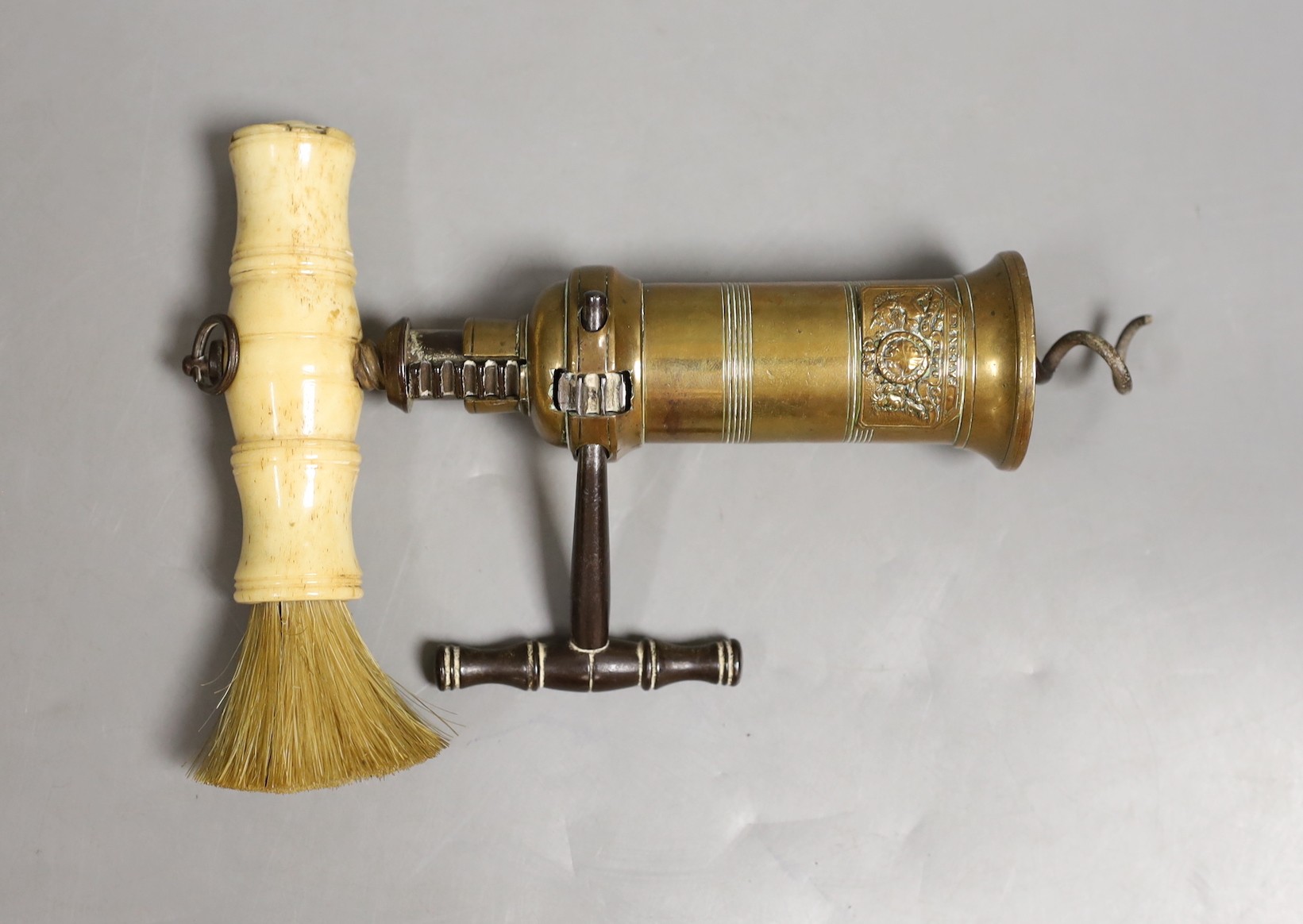 A 19th century Thomason type patent corkscrew with bone handle, 18 cms high.